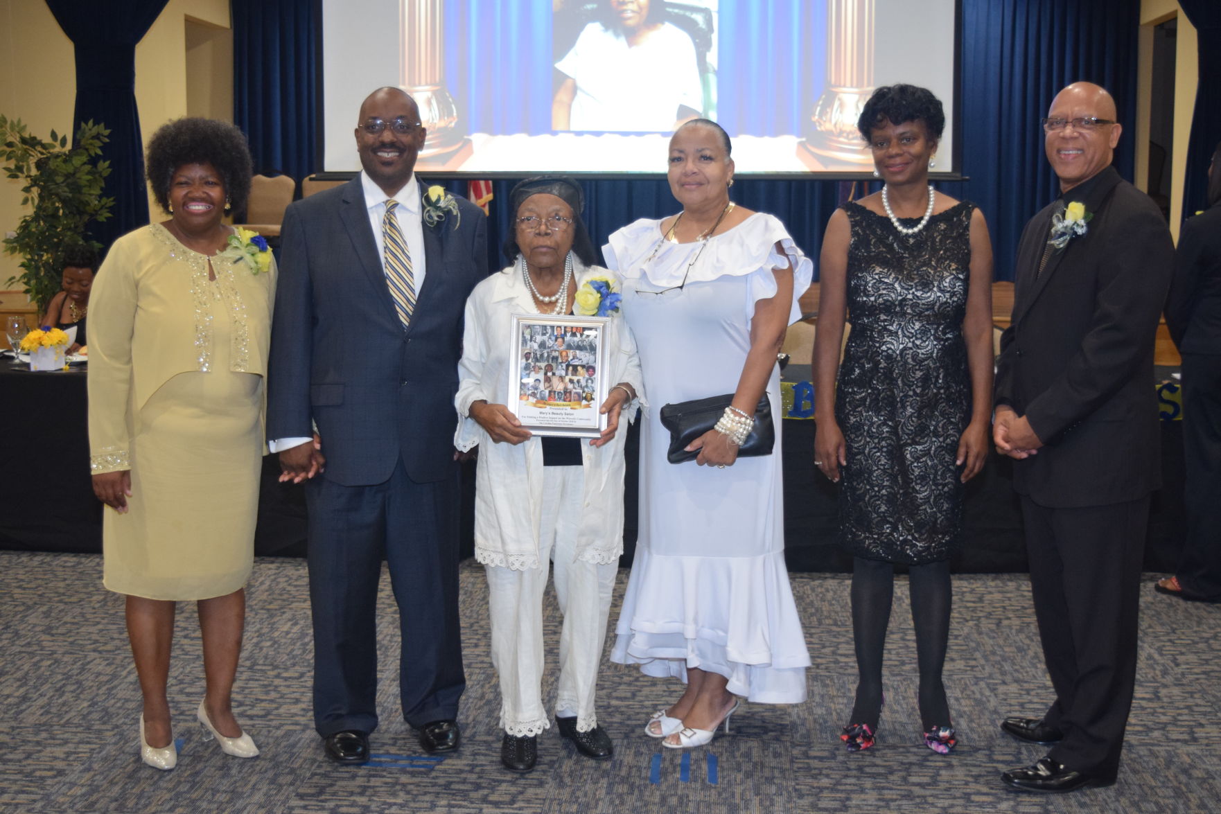 Mary Vance Morton and daughter Joan Morton accepts Legacy Award for Mary's Beauty Salon.